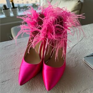 Bright pink feather shoes by Jessica Simpson
